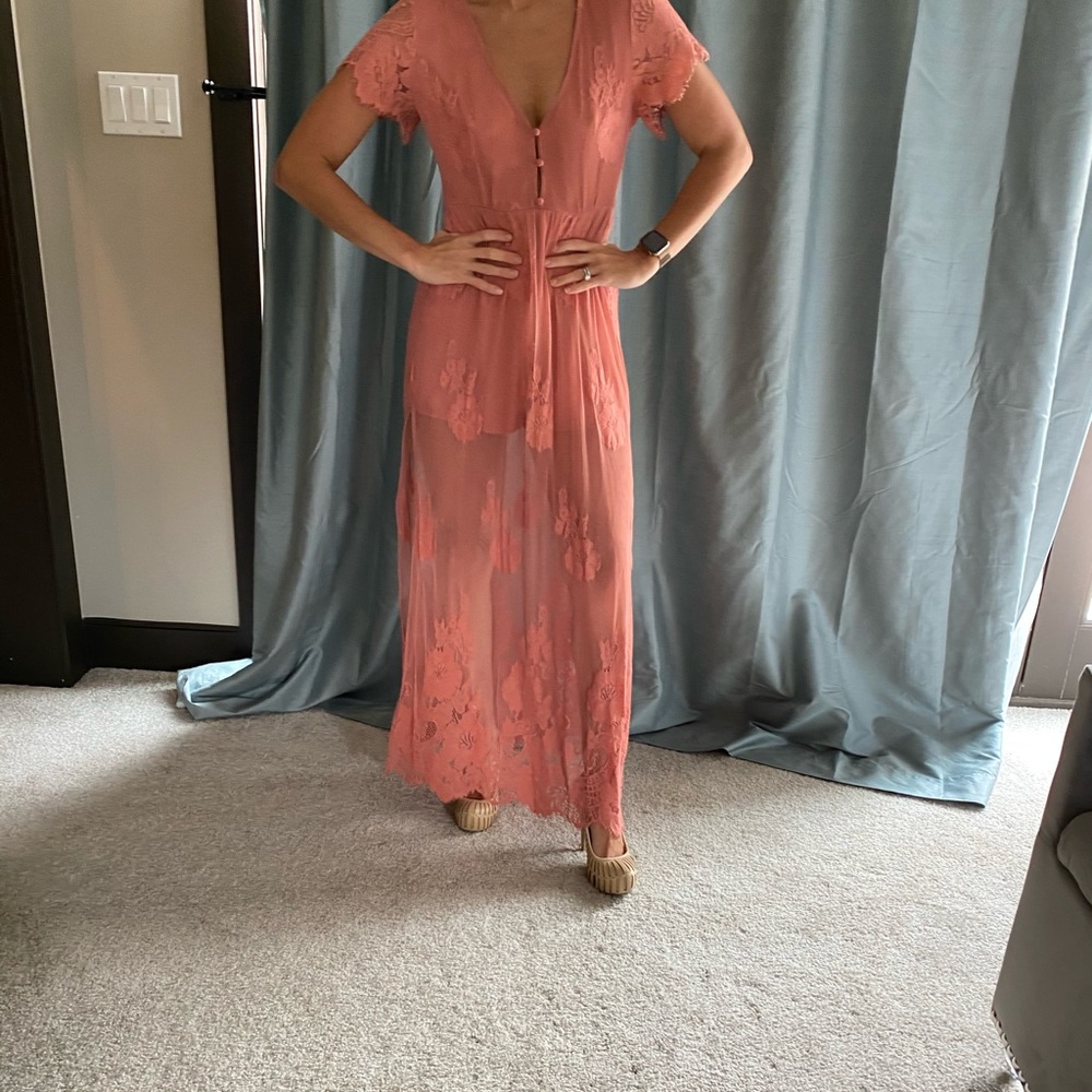 Short romper with lace overlay. Worn only once